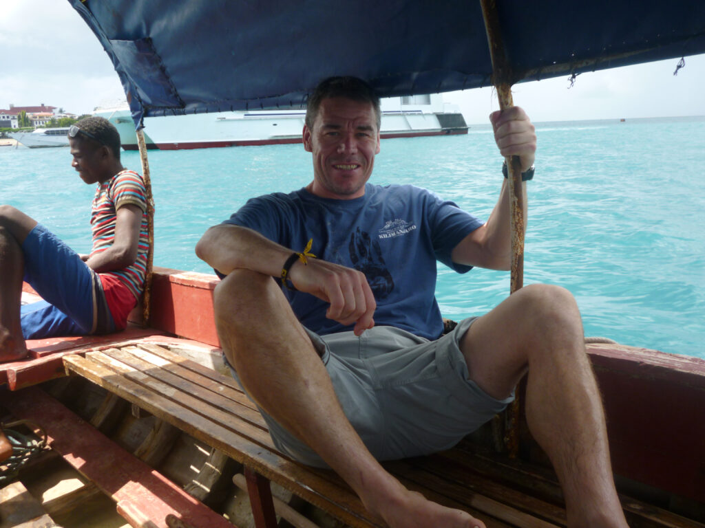 Roy Davies ‘on the water near Zanzibar preparing for Coral reef dive